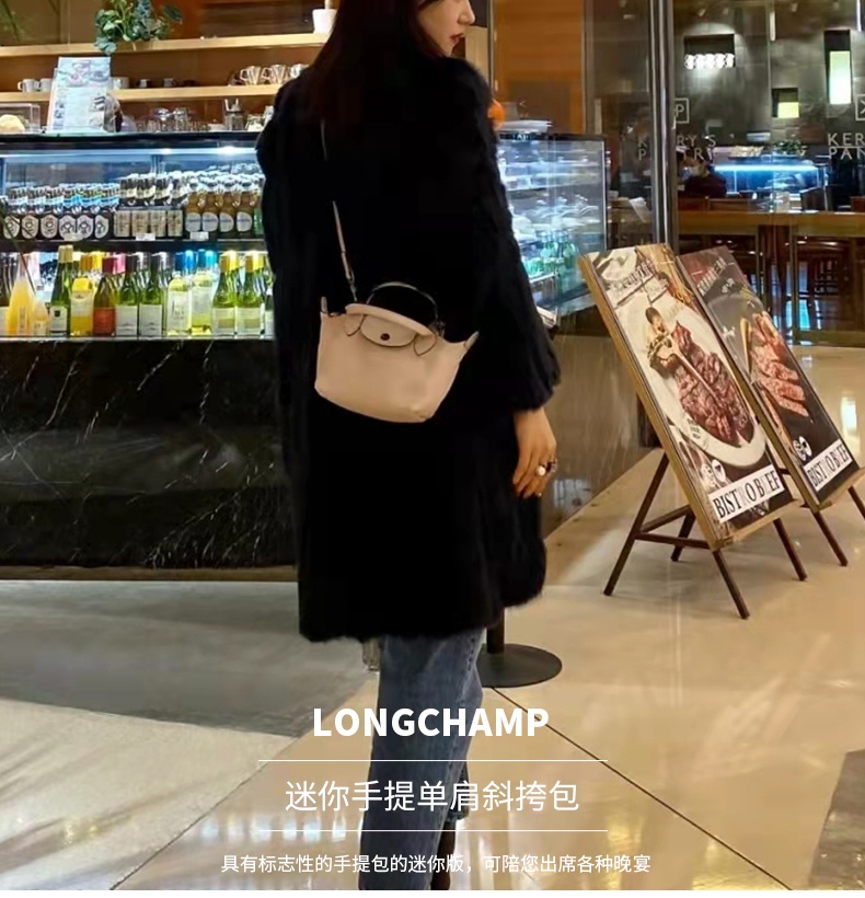 商品Longchamp|珑骧 女士LE PLIAGE CUIR系列迷你短柄皮质手提包饺子包L1500 987（香港仓发�货）,价格¥3361,第1张图片详细描述