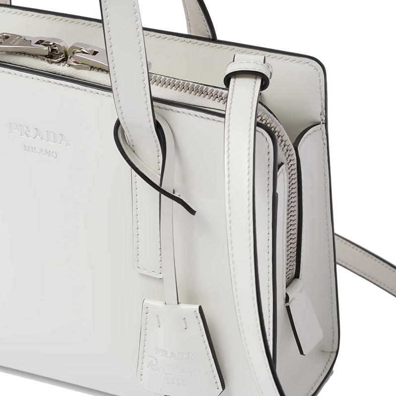 商品Prada|PRADA/普拉达 22新款Re-Edition 1995系列 女士迷你款白色皮革热印徽标配拉链式隔层单肩斜挎手提包,价格¥24800,第5张图片详细描述