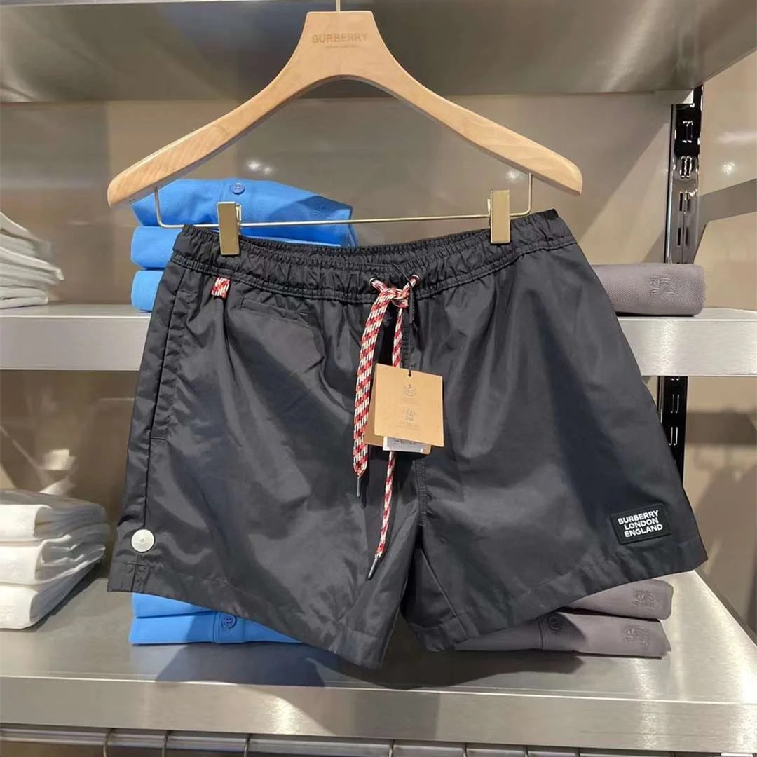 商品Burberry|BURBERRY/博柏利 男士黑色纤维微标贴片条纹抽绳游泳短裤80226381,价格¥1005,第7张图片详细描述