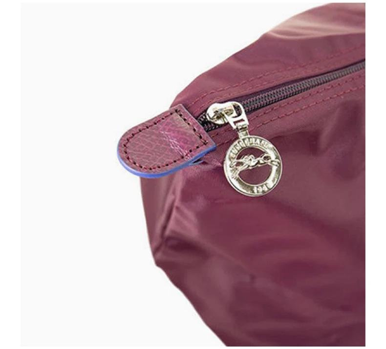 商品[国内直发] Longchamp|LONGCHAMP 女士紫色尼龙配皮刺绣LOGO手提包 1623619P22,价格¥957,第8张图片详细描述