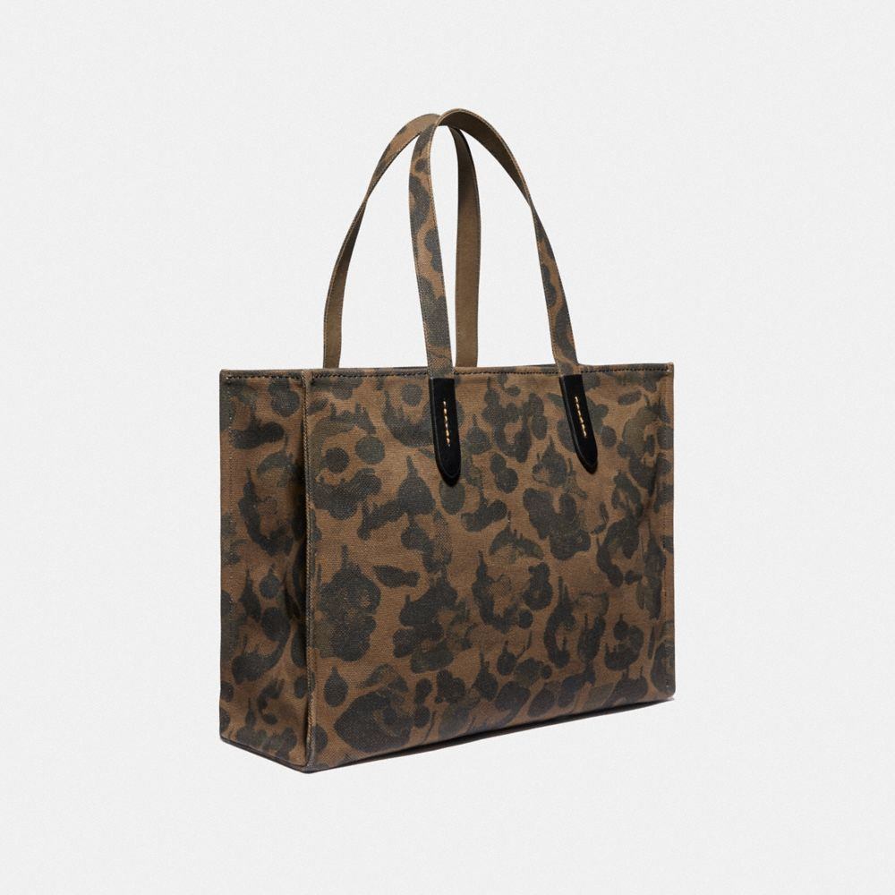 商品[国内直发] Coach|蔻驰托特包COACH 奢侈品男女通用专柜款迷彩帆布印恐龙图案手提单肩包托特包大容量旅行包986   OLL38,价格¥1476,第5张图片详细描述