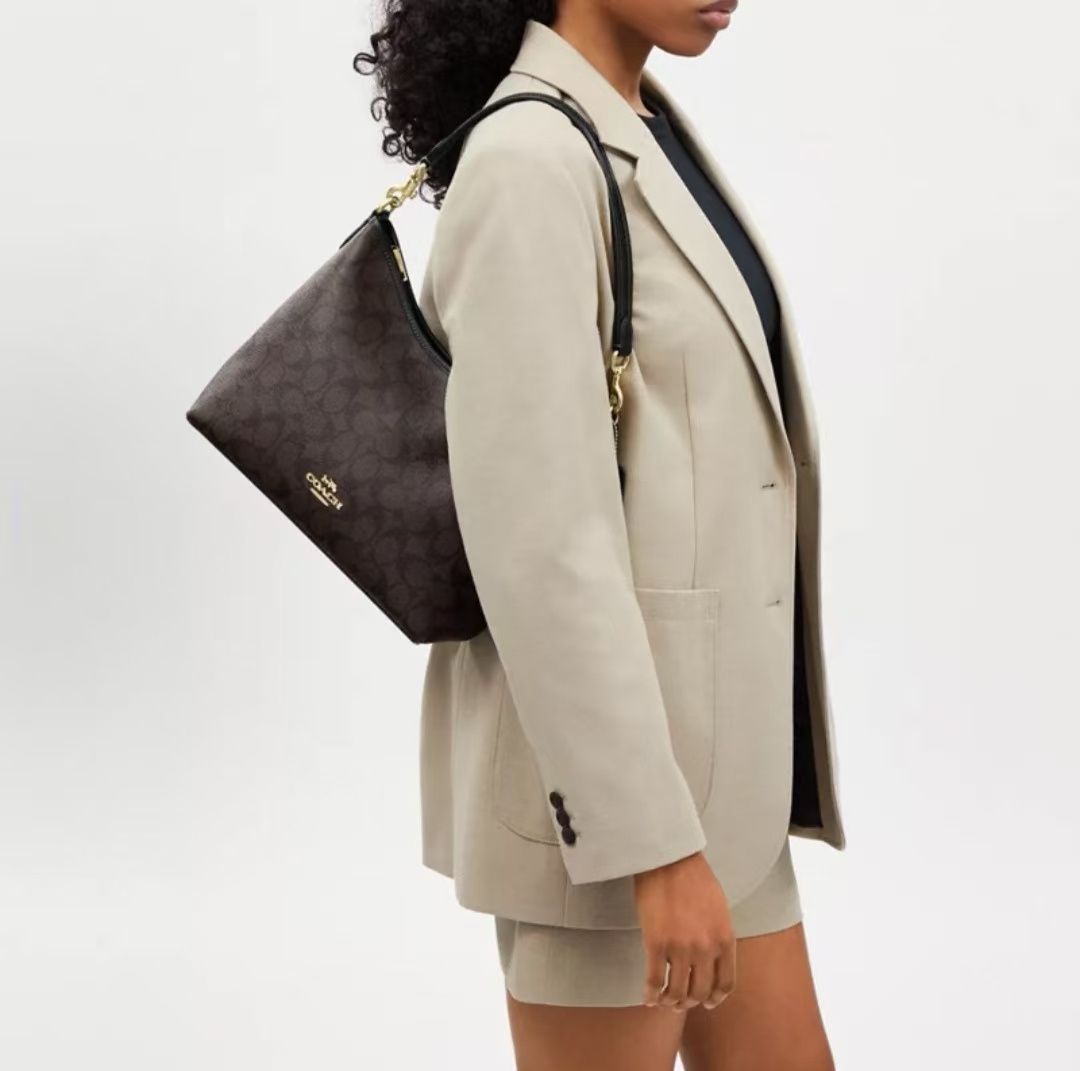 商品[国内直发] Coach|COACH蔻驰 Laurel 31 通勤大容量可拆卸肩带 标志性涂层帆布和光滑皮革 流浪包腋下包单肩斜挎手提包 大号 女款 棕黑色,价格¥3093,第5张图片详细描述