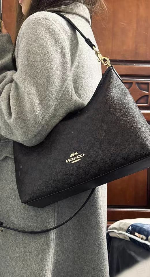 商品[国内直发] Coach|COACH蔻驰 Laurel 31 通勤大容量可拆卸肩带 标志性涂层帆布和光滑皮革 流浪包腋下包单肩斜挎手提包 大号 女款 棕黑色,价格¥3093,第7张图片详细描述