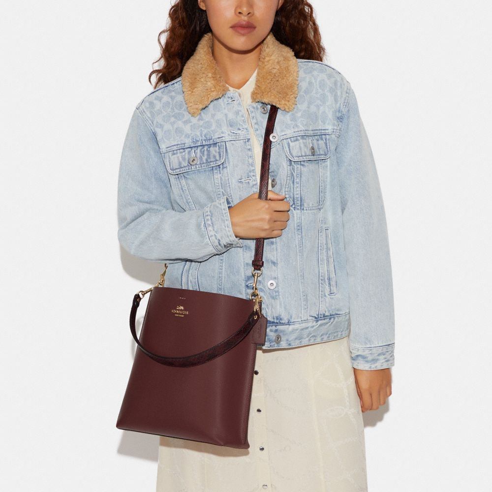 商品[国内直发] Coach|蔻驰水桶包女奢侈品专柜款Mollie28 纯色皮质手提单肩斜挎包水桶包大号礼物送女友CA214 SVNBA,价格¥784,第4张图片详细描述
