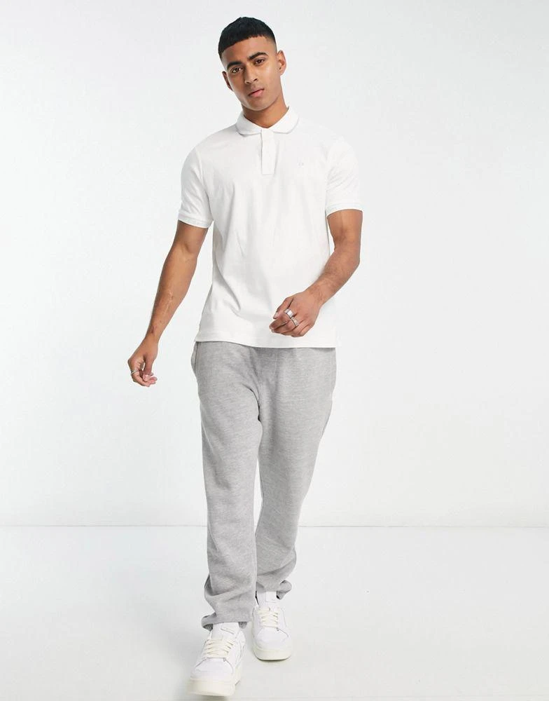 商品Calvin Klein|Calvin Klein logo jacquard polo shirt in white,价格¥464,第4张图片详细描述