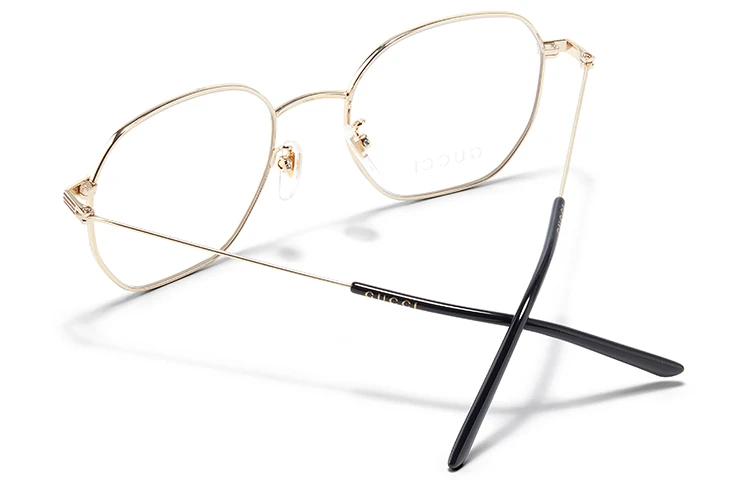 商品[国内直发] Gucci|古驰 透明镜片金色镜框 文艺 金属 不规则形 光学镜架 男女同款情侣款,价格¥2133,第9张图片详细描述