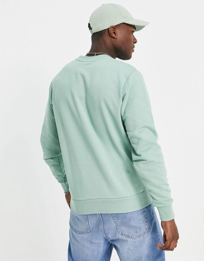 商品Calvin Klein|Calvin Klein hybrid logo sweatshirt in teal green,价格¥439,第2张图片详细描述