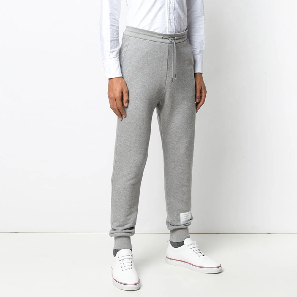 THOM BROWNE 灰色男士运动裤 MJQ066A-03377-055 商品