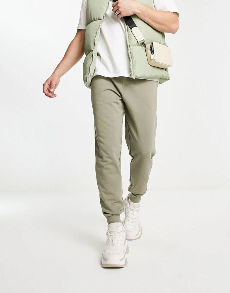 商品ASOS|ASOS DESIGN tapered joggers in green,价格¥192,第1张图片