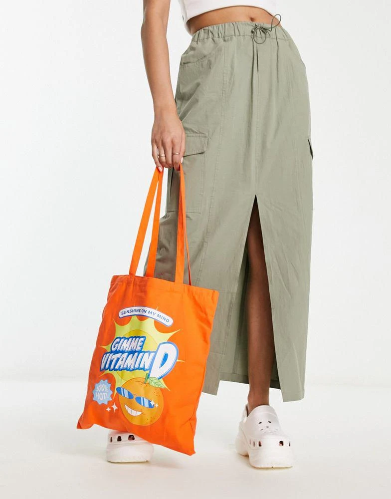 商品Skinnydip|Skinnydip Vitamin D slogan tote bag in orange,价格¥60,第2张图片详细描述