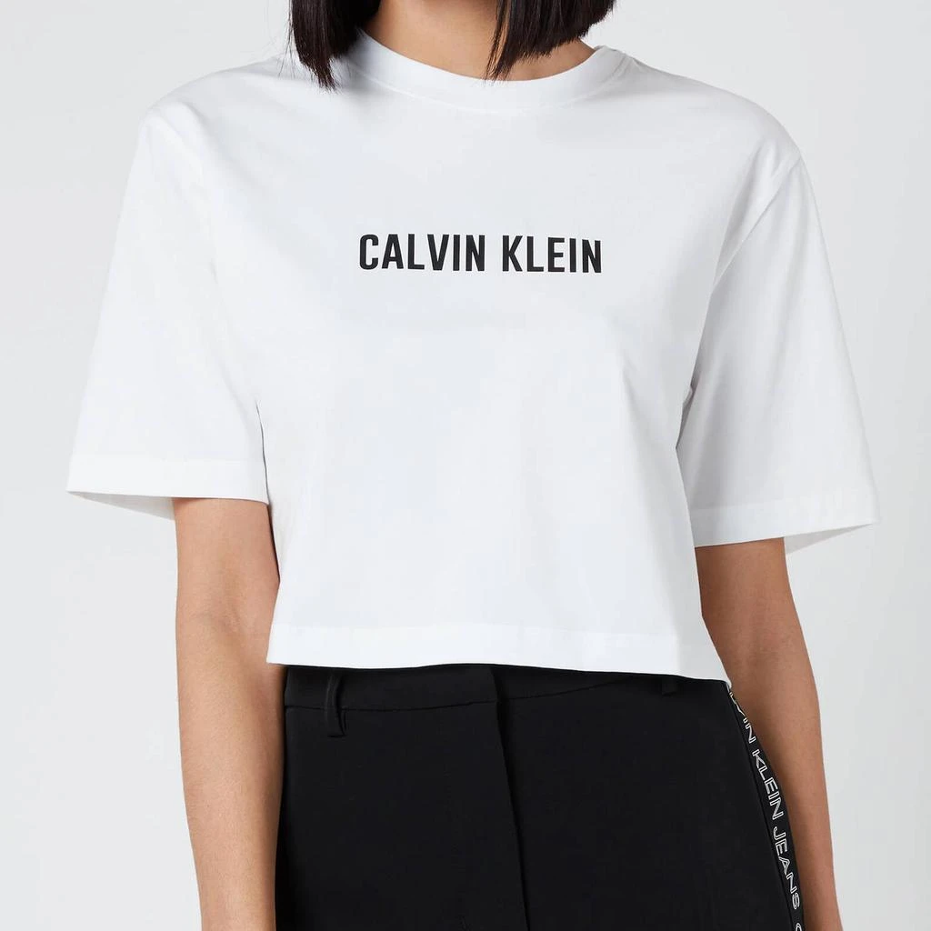 商品Calvin Klein|Calvin Klein Performance Women's Short Sleeve Cropped T-Shirt - Bright White,价格¥277,第1张图片