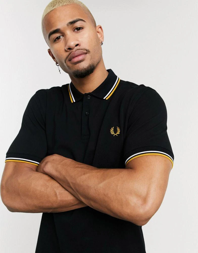 商品Fred Perry|Fred Perry twin tipped logo polo in black/white/gold,价格¥560,第3张图片详细描述