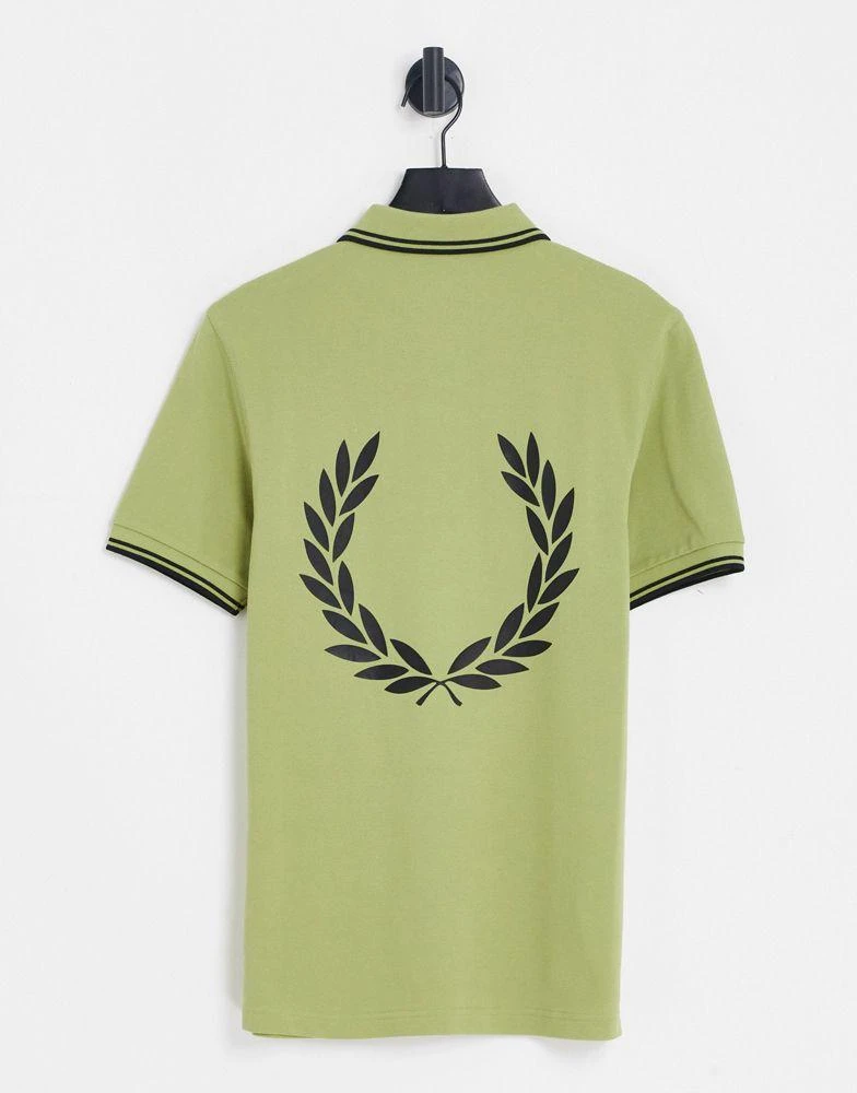 商品Fred Perry|Fred Perry back print polo shirt exclusive to ASOS in green,价格¥489,第1张图片