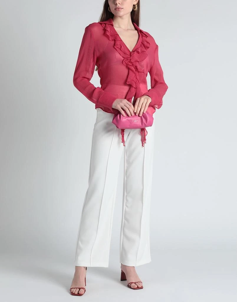 商品BLUMARINE|Solid color shirts & blouses,价格¥3628,第2张图片详细描述