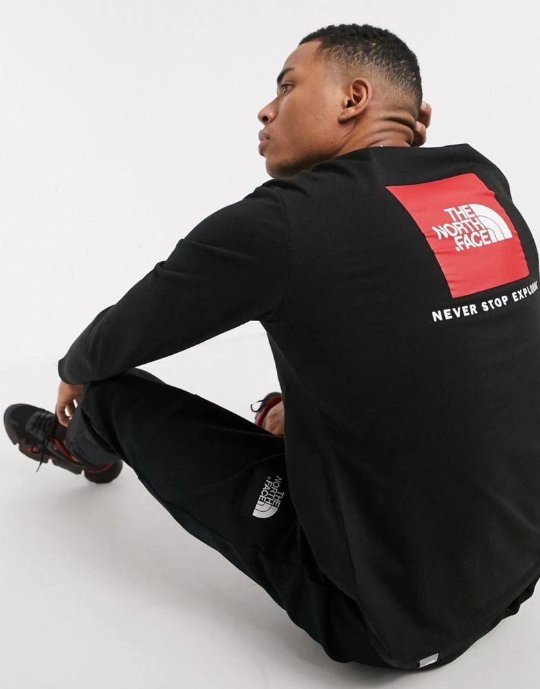 商品The North Face|The North Face Redbox back print long sleeve t-shirt in black,价格¥226,第1张图片