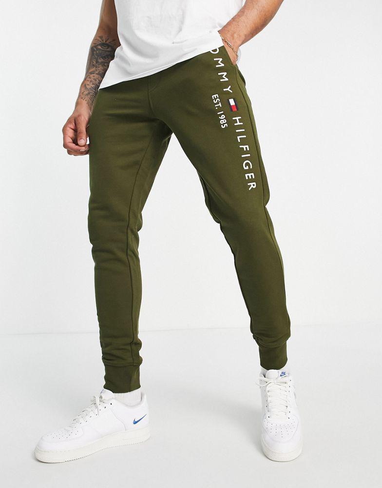 商品Tommy Hilfiger|Tommy Hilfiger embroidered flag logo cuffed joggers in green,价格¥446,第5张图片详细描述