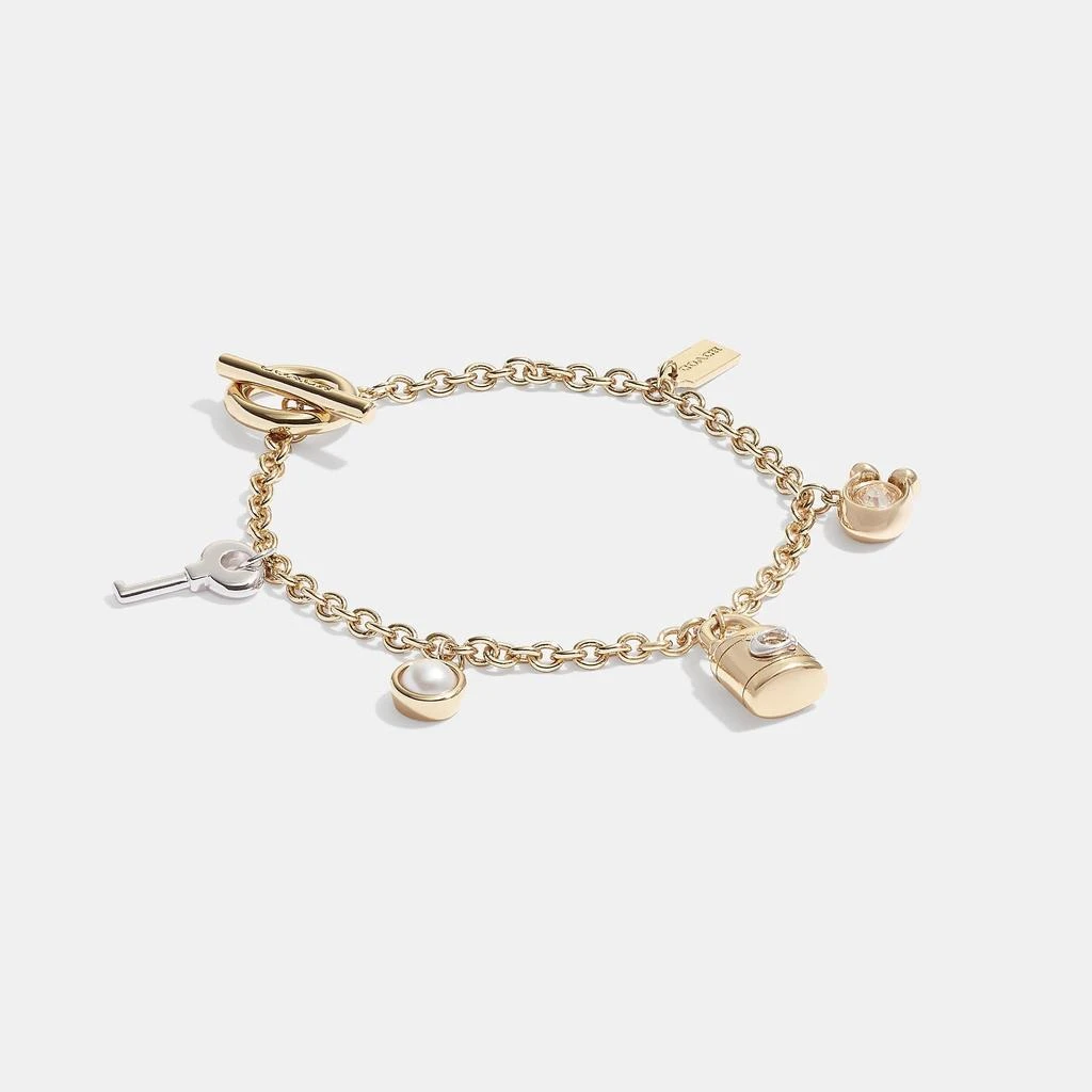 商品Coach|Coach Outlet Signature Padlock And Key Charm Bracelet,价格¥514,第1张图片