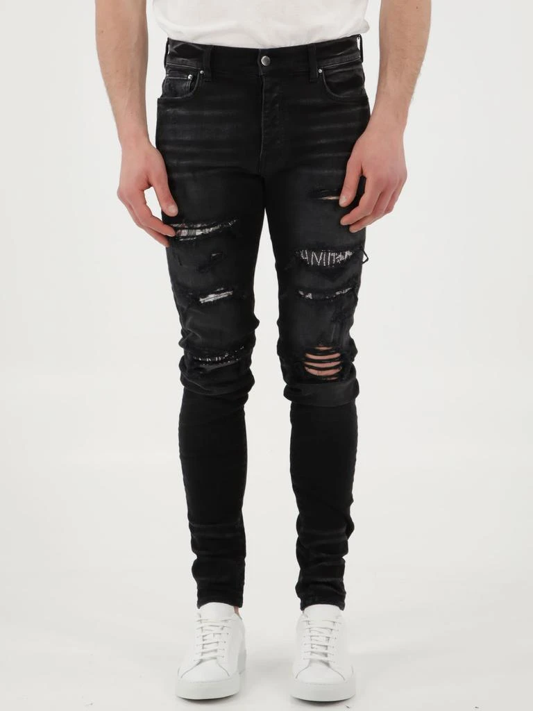 商品AMIRI|Amiri Black Hibiscus jeans,价格¥8002,第1张图片