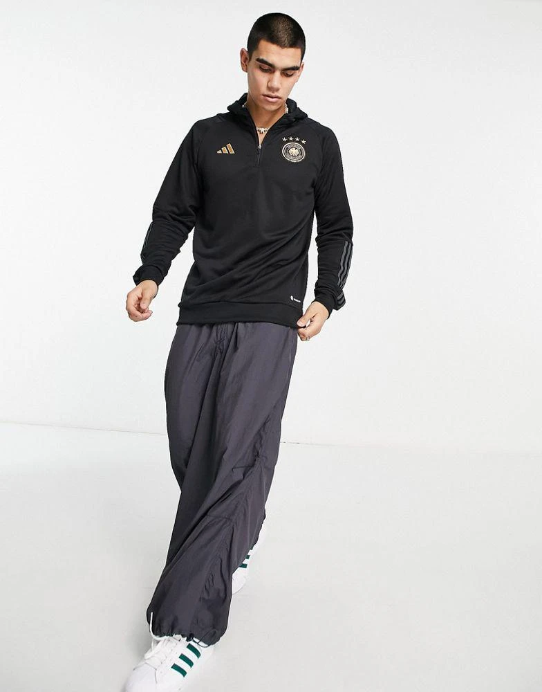 商品Adidas|adidas Football Germany World Cup 2022 off-pitch 3 stripe 1/4 zip hoodie in black,价格¥536,第4张图片详细描述