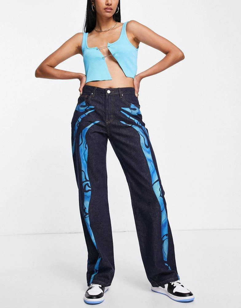 商品The Kript|The Kript relaxed jeans in blue denim with contrast print,价格¥384,第1张图片