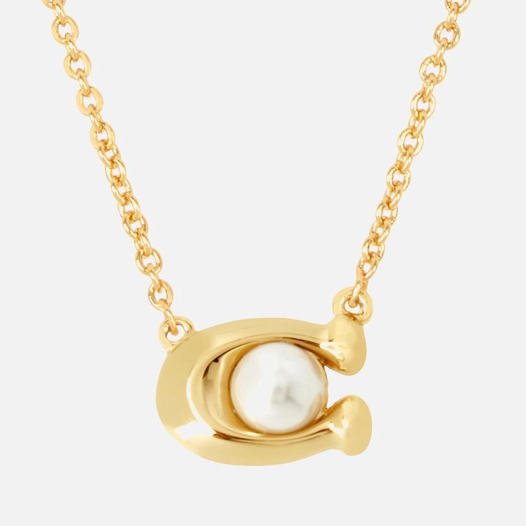 商品Coach|Coach Women's Pearl Signature Gold Tone Pendant Necklace - Gold/White,价格¥668,第2张图片详细描述