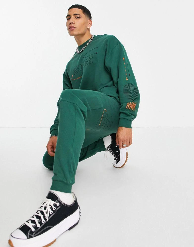 商品ASOS|ASOS DESIGN co-ord tapered joggers with cargo pockets and multi placement outdoors prints,价格¥160,第4张图片详细描述