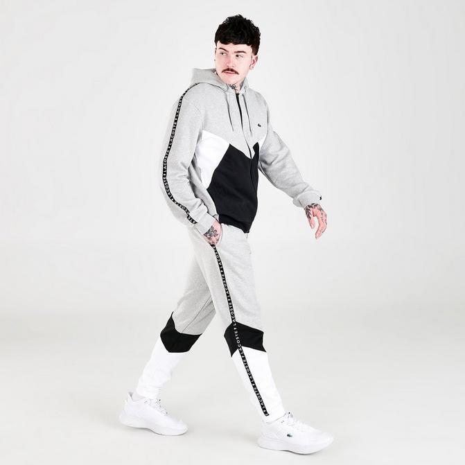 商品Lacoste|Men's Lacoste Signature Striped Colorblock Fleece Jogger Pants,价格¥252,第1张图片