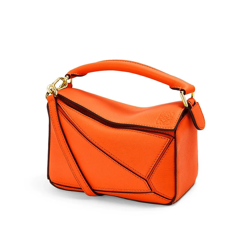 商品Loewe|【预售3-7天】LOEWE/罗意威 Puzzle系列 女士迷你橙色牛皮革切割几何线条包缝设计徽标压纹肩背斜挎手提包322.30.U95-9100,价格¥14718,第1张图片