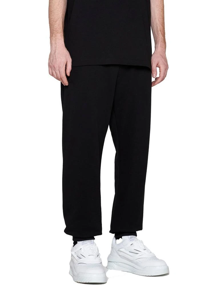 商品Versace|Versace Logo Printed Tapered Track Trousers,价格¥2453,第2张图片详细描述