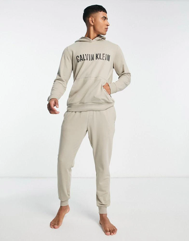 商品Calvin Klein|Calvin Klein co-ord lounge hoodie with contrast chest logo in oatmeal,价格¥718,第3张图片详细描述