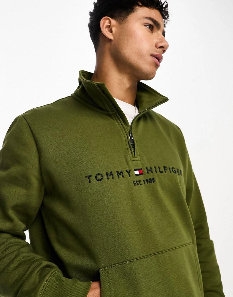商品Tommy Hilfiger|Tommy Hilfiger tommy logo mock neck sweatshirt in putting green,价格¥807,第2张图片详细描述