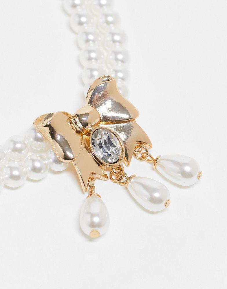 商品Reclaimed Vintage|Reclaimed Vintage pearl necklace with bow drop in gold,价格¥83,第4张图片详细描述