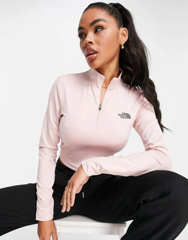 商品The North Face|The North Face 1/4 zip cropped long sleeve t-shirt in pink Exclusive at ASOS,价格¥232,第3张图片详细描述