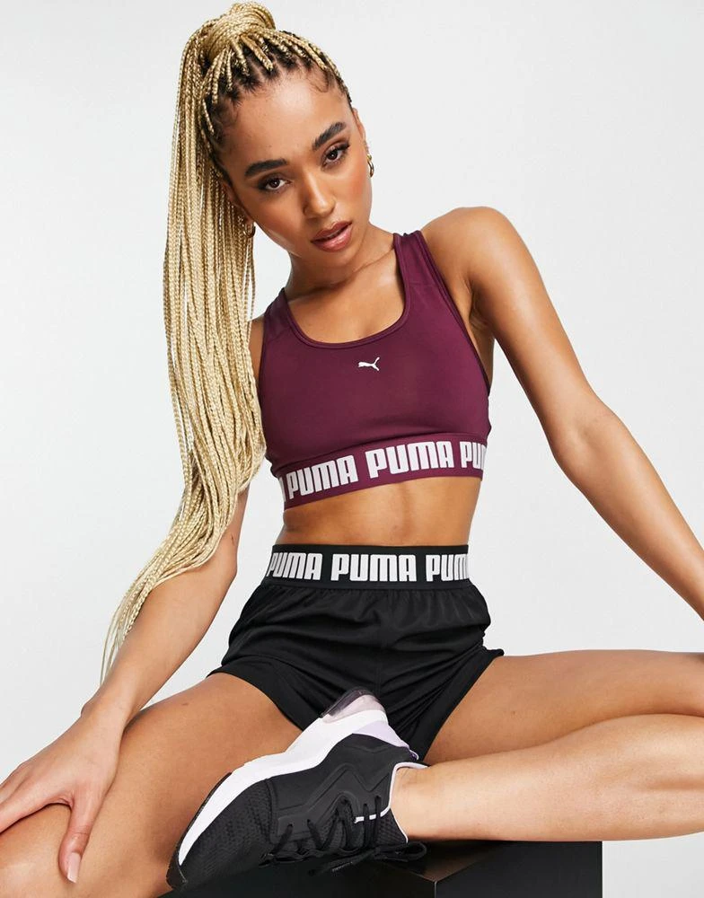 商品Puma|Puma Training Strong mid support sports bra in plum,价格¥143,第1张图片