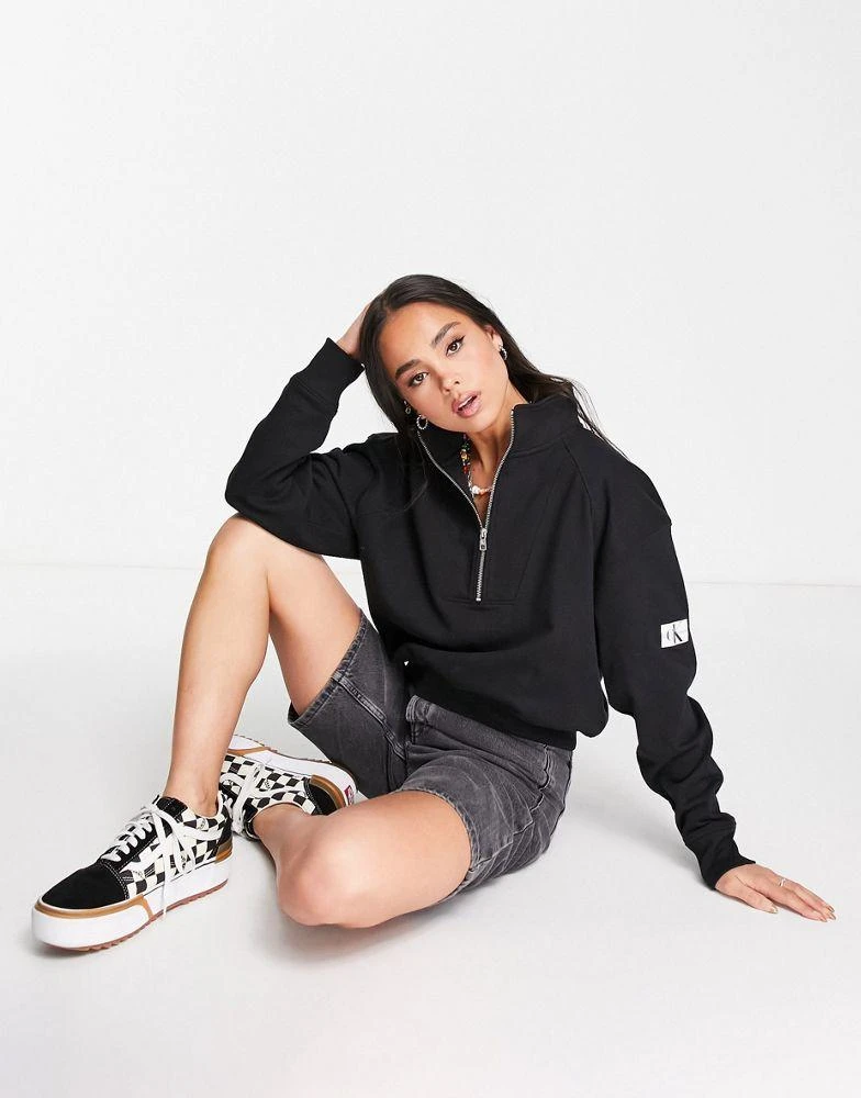商品Calvin Klein|Calvin Klein Jeans cotton badge logo half zip sweatshirt in black - BLACK,价格¥801,第3张图片详细描述