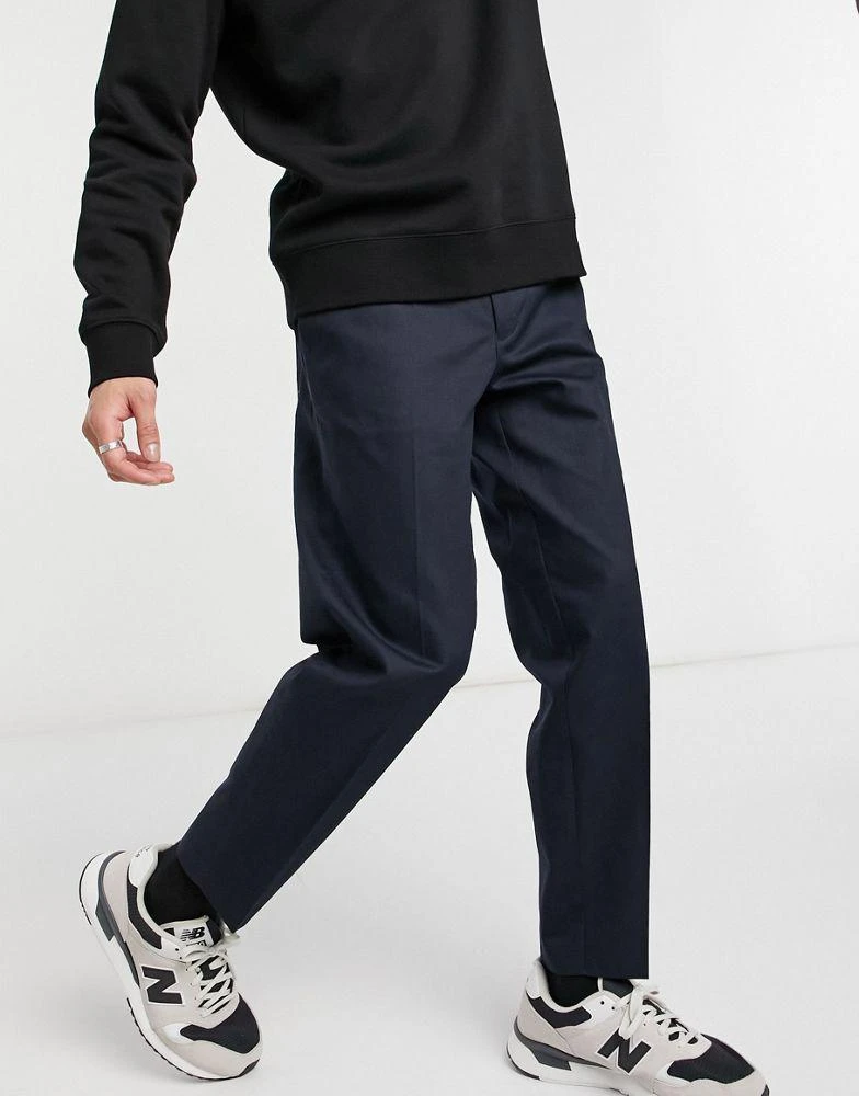 商品Burton Menswear|Burton Menswear tapered trousers with elasticated waistband in navy,价格¥177,第1张图片