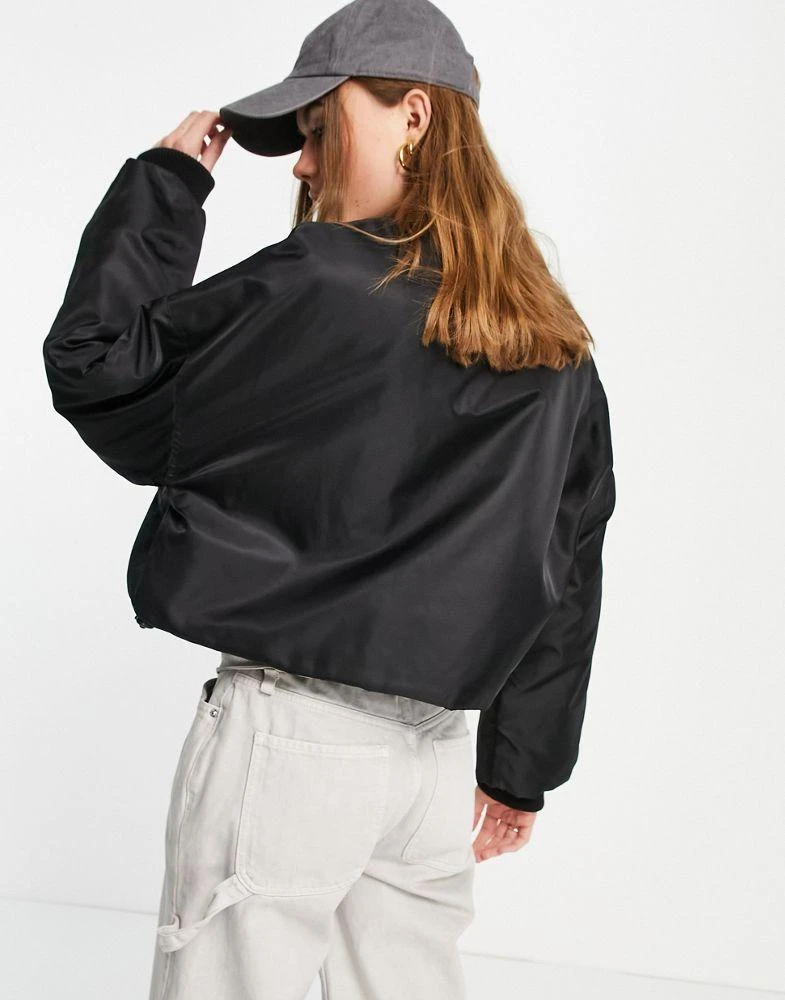 商品Topshop|Topshop cropped collarless bomber jacket in black,价格¥276,第2张图片详细描述