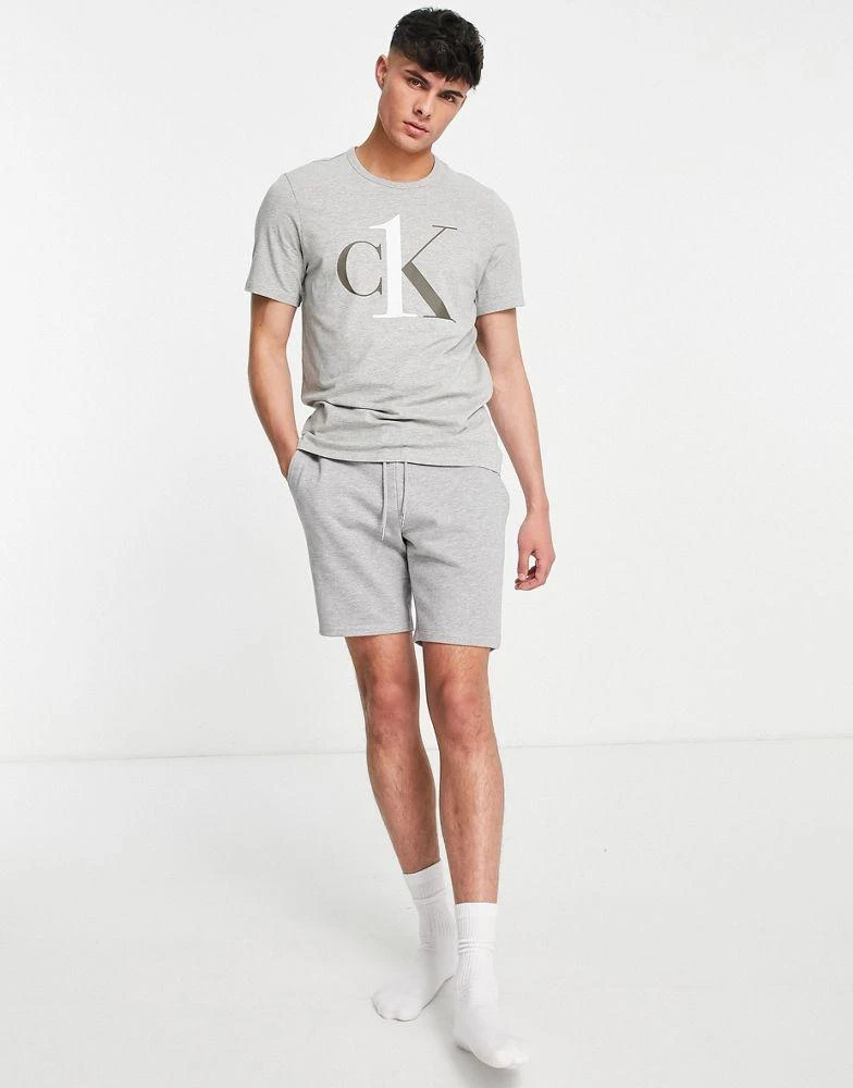 商品Calvin Klein|Calvin Klein CK1 graphic lounge t-shirt in grey,价格¥171,第3张图片详细描述