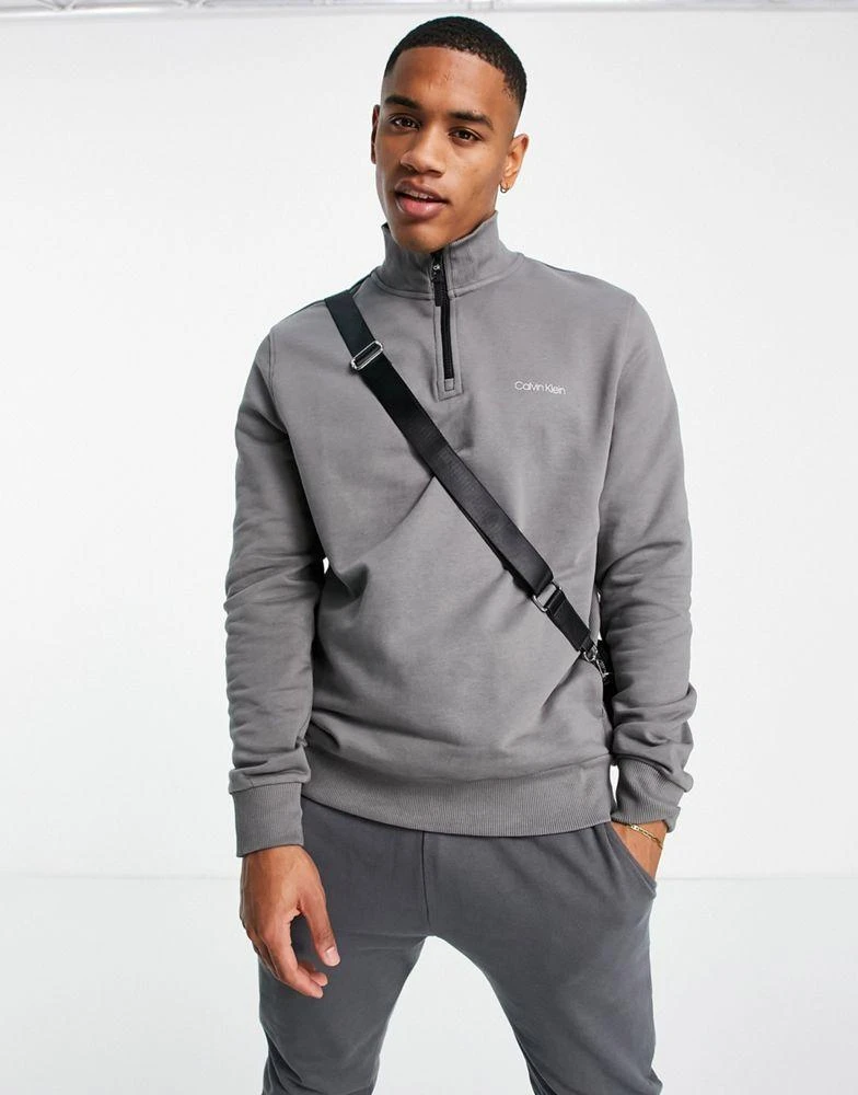商品Calvin Klein|Calvin Klein small chest logo half zip sweatshirt in grey,价格¥530,第1张图片