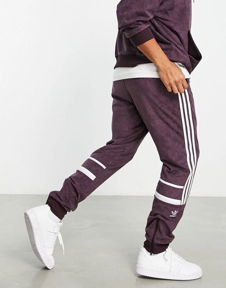 商品Adidas|adidas Originals Adicolor polyester blend three stripe joggers in maroon,价格¥511,第3张图片详细描述