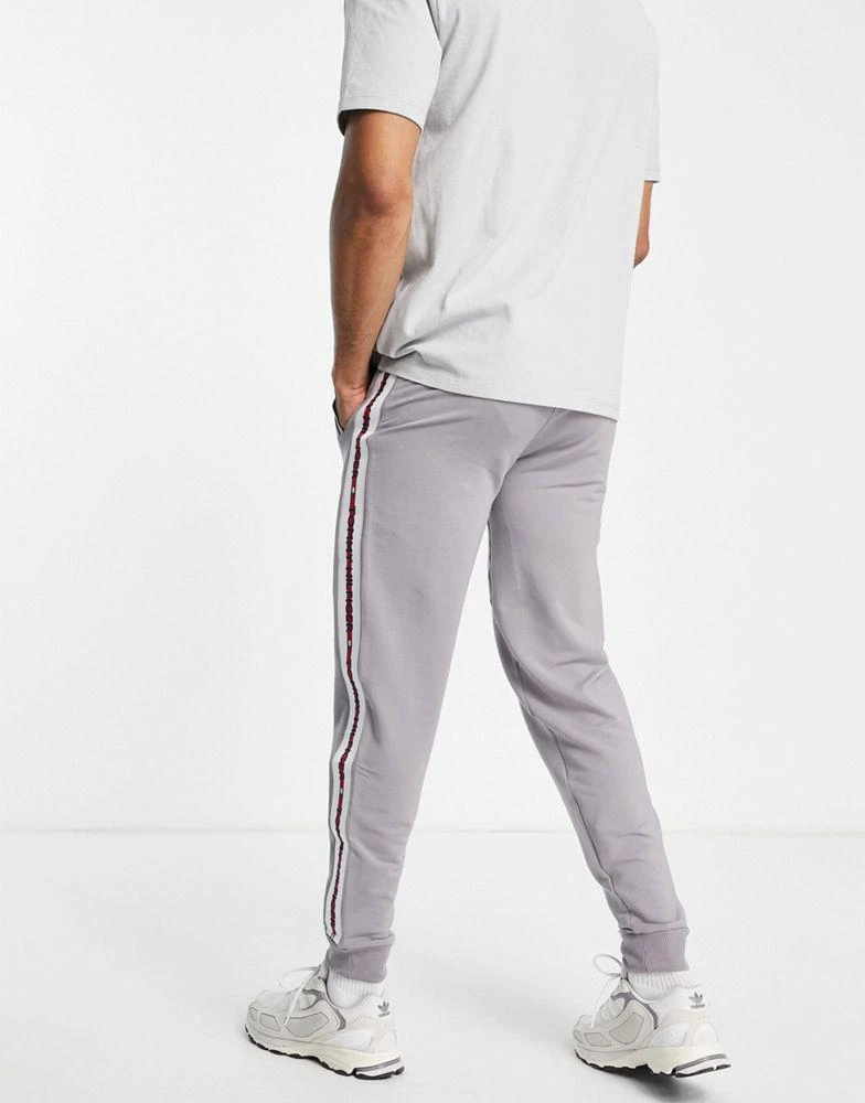 商品Tommy Hilfiger|Tommy Hilfiger exclusive to ASOS flag joggers in washed grey,价格¥373,第3张图片详细描述