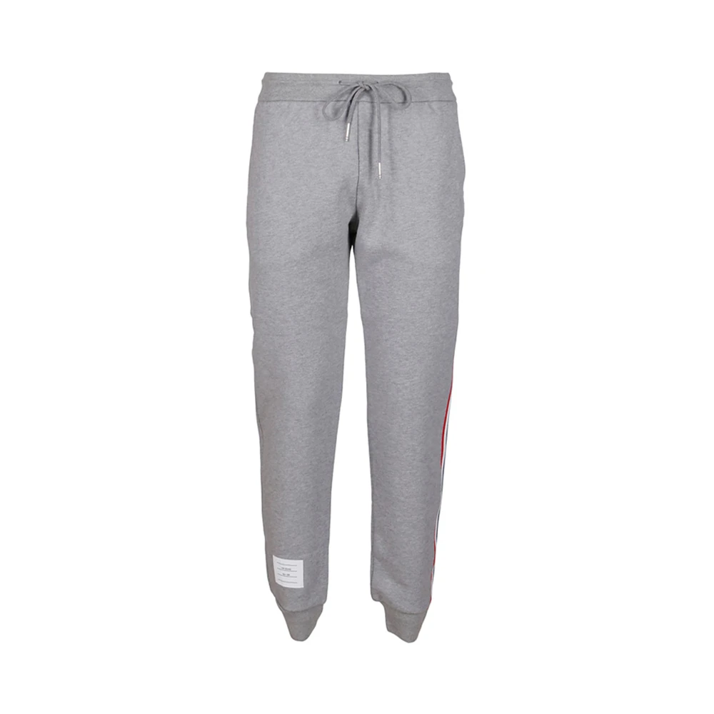 商品[国内直发] Thom Browne|THOM BROWNE 灰色女士运动裤 FJQ024A-03377-055,价格¥3397,第1张图片