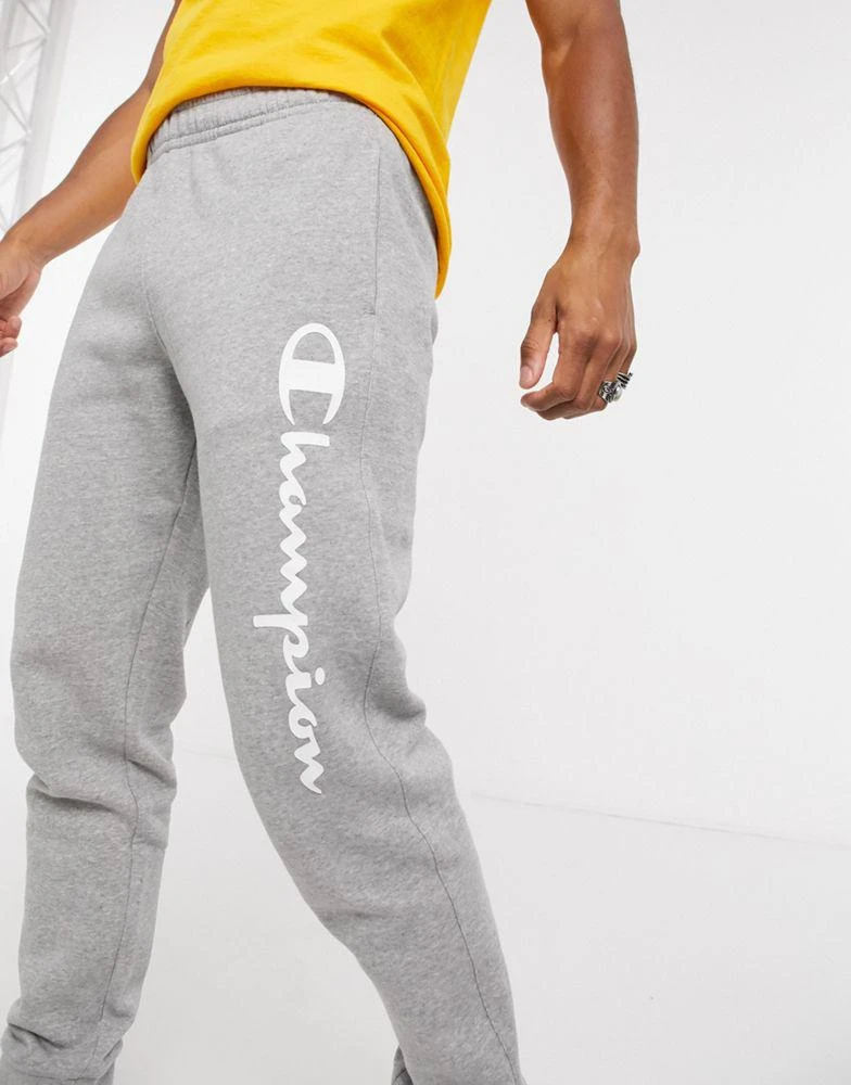 商品CHAMPION|Champion large logo tracksuit bottoms in grey,价格¥323,第3张图片详细描述