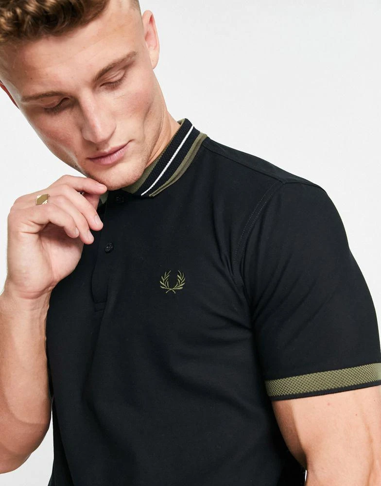 商品Fred Perry|Fred Perry textured collar polo shirt in black,价格¥398,第3张图片详细描述