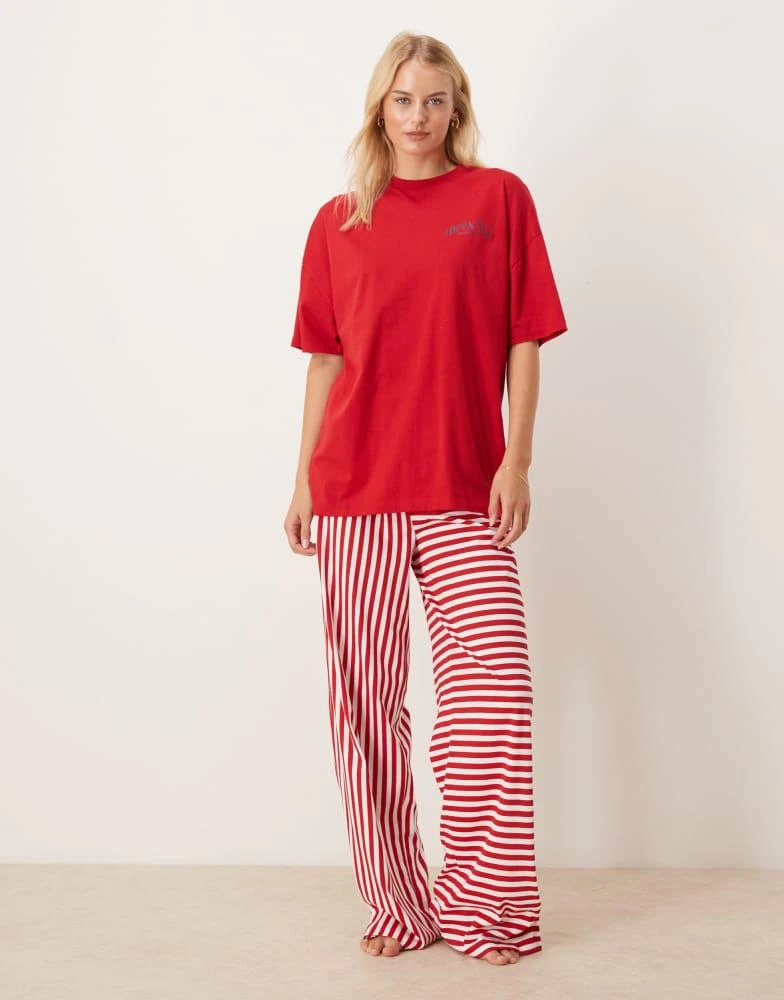 商品ASOS|ASOS DESIGN Tall oversized graphic tee & wide leg trouser pyjama set in apre ski print,价格¥245,第2张图片详细描述