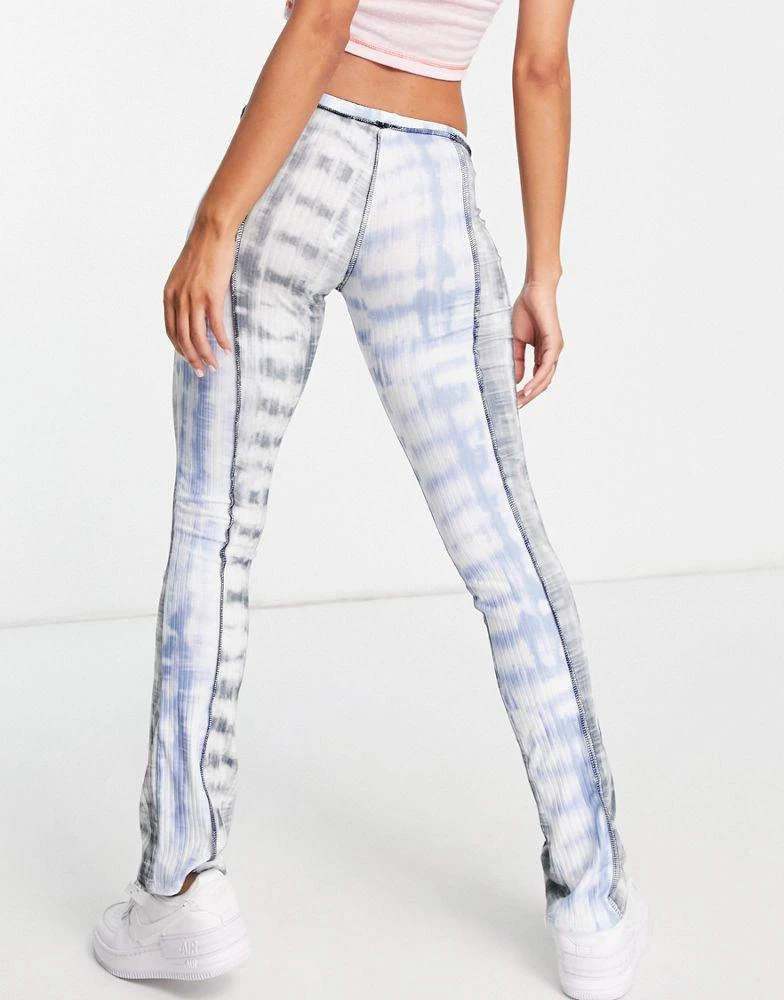 商品ASOS|ASOS DESIGN rib flare trouser with exposed seam in cut about tie dye print,价格¥82,第4张图片详细描述