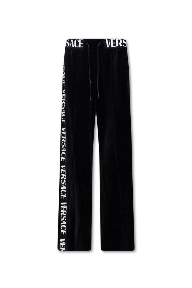 商品Versace|Versace Logo Printed Velvet Drawstring Pants,价格¥6353,第1张图片