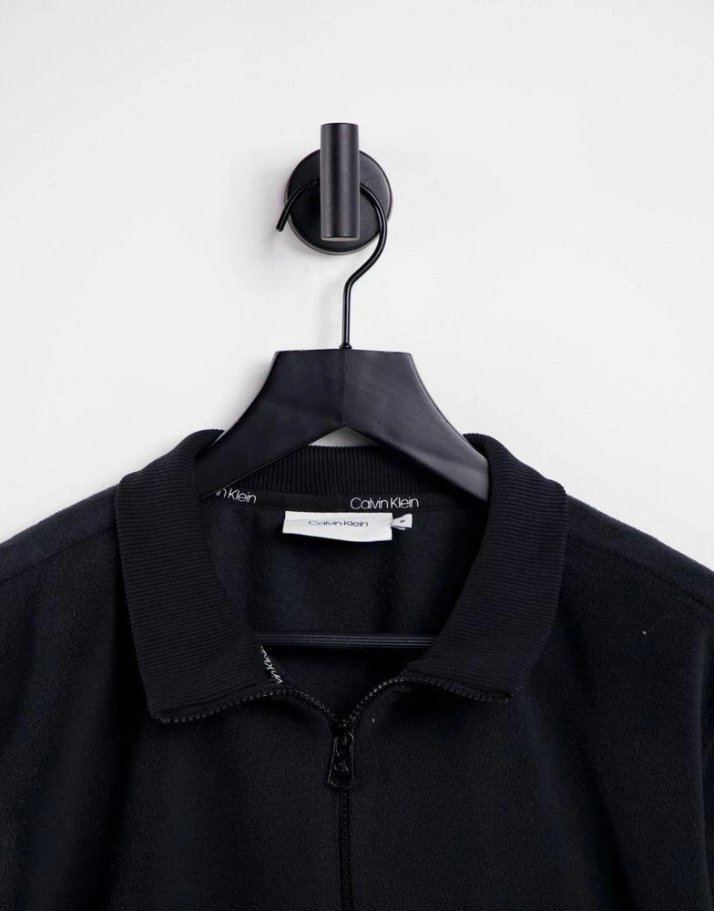 商品Calvin Klein|Calvin Klein ASOS Exclusive polar fleece half zip sweatshirt in black,价格¥365,第3张图片详细描述