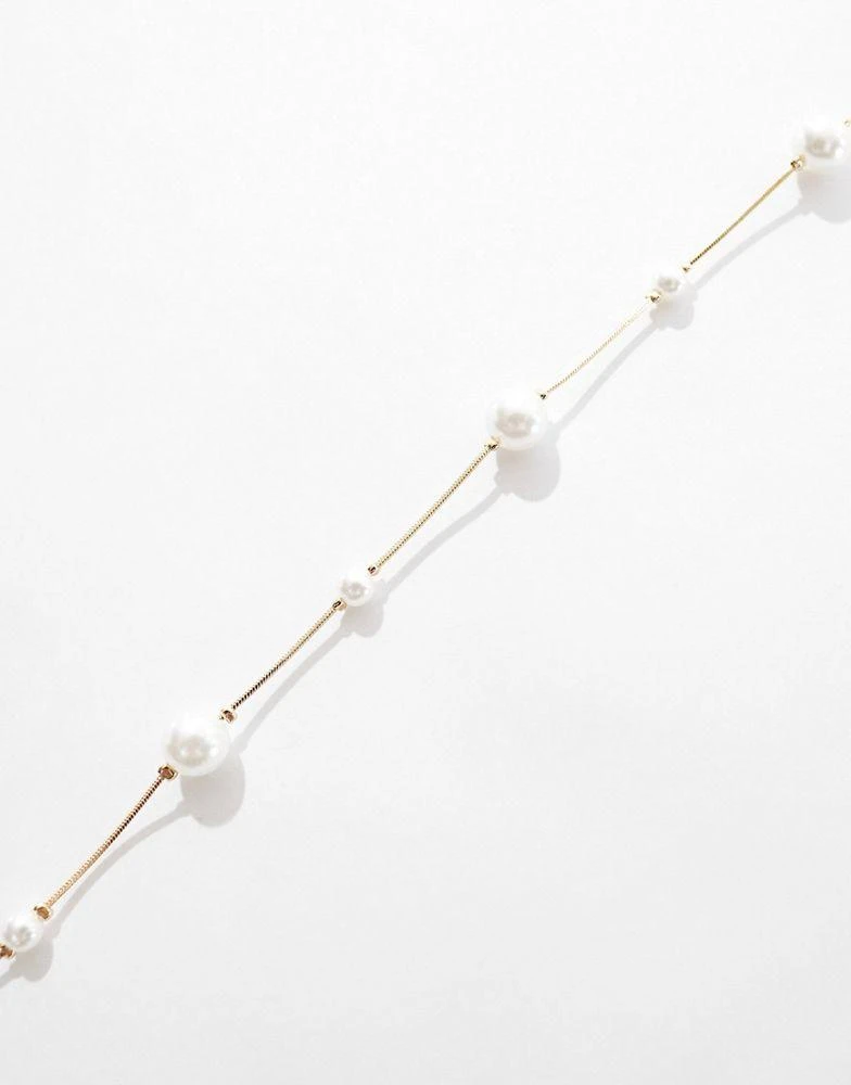 商品ASOS|ASOS DESIGN short necklace with mixed sized faux pearl in gold tone,价格¥60,第2张图片详细描述