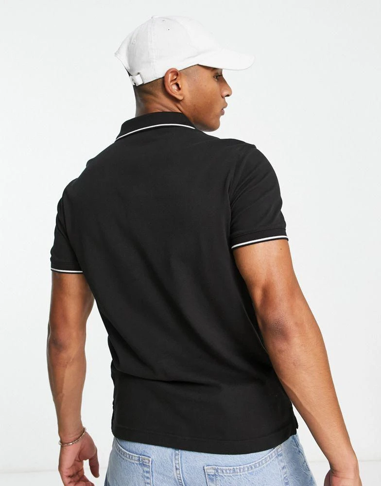 商品Calvin Klein|Calvin Klein logo tipped stretch slim fit pique polo in black,价格¥786,第2张图片详细描述